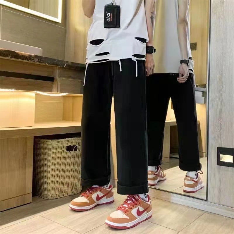 Jeans Holgados de Hombre con Estampado de Estrella Negra - Tendencia de Moda